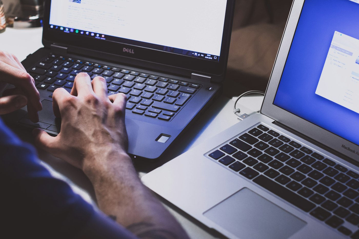 Editor researching a guide on a laptop